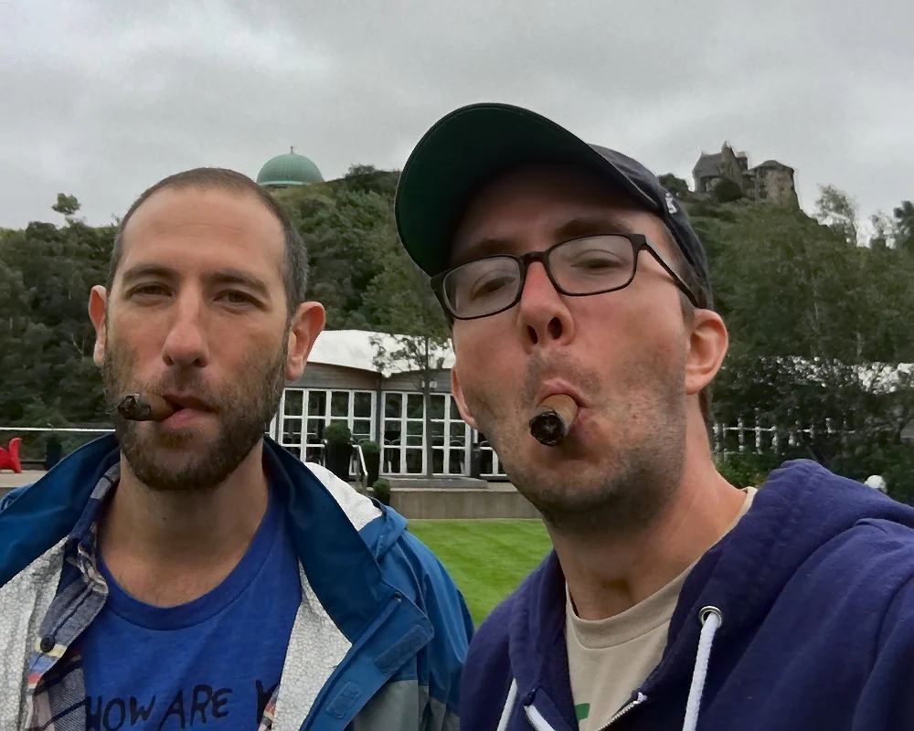 Comedian Ari Shaffir smoking a cigar with comedian Joe List of Tuesdays with Stories. Find more about Joe at www.tuesdayspod.com/joe-list