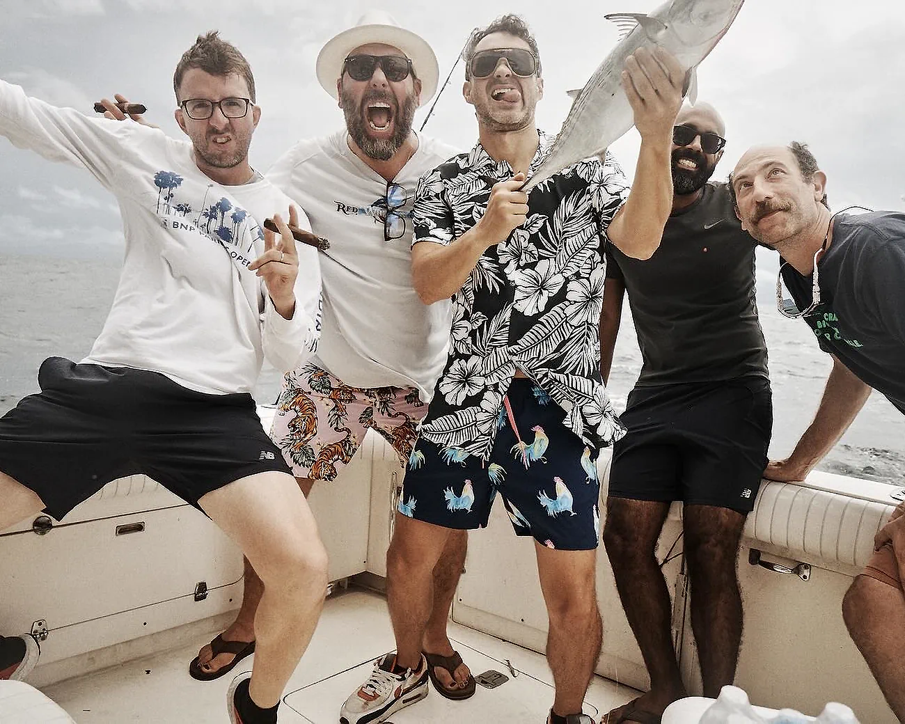Comedians Bert Kreischer, Ari Shaffir, and Umar Kahn fishing with comedians Mark and Joe of Tuesdays with Stories. Find more Tuesdays with Stories photos at at www.tuesdayspod.com/photos