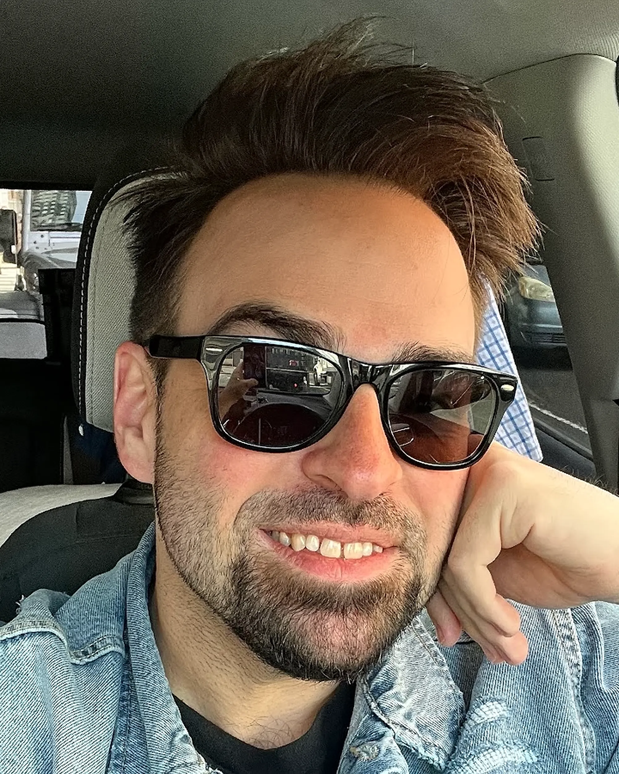 Chuck Staton III, producer of Tuesdays with Stories, taking a selfie in shades. Find more about Chuck Staton at www.tuesdayspod.com/chuck-staton