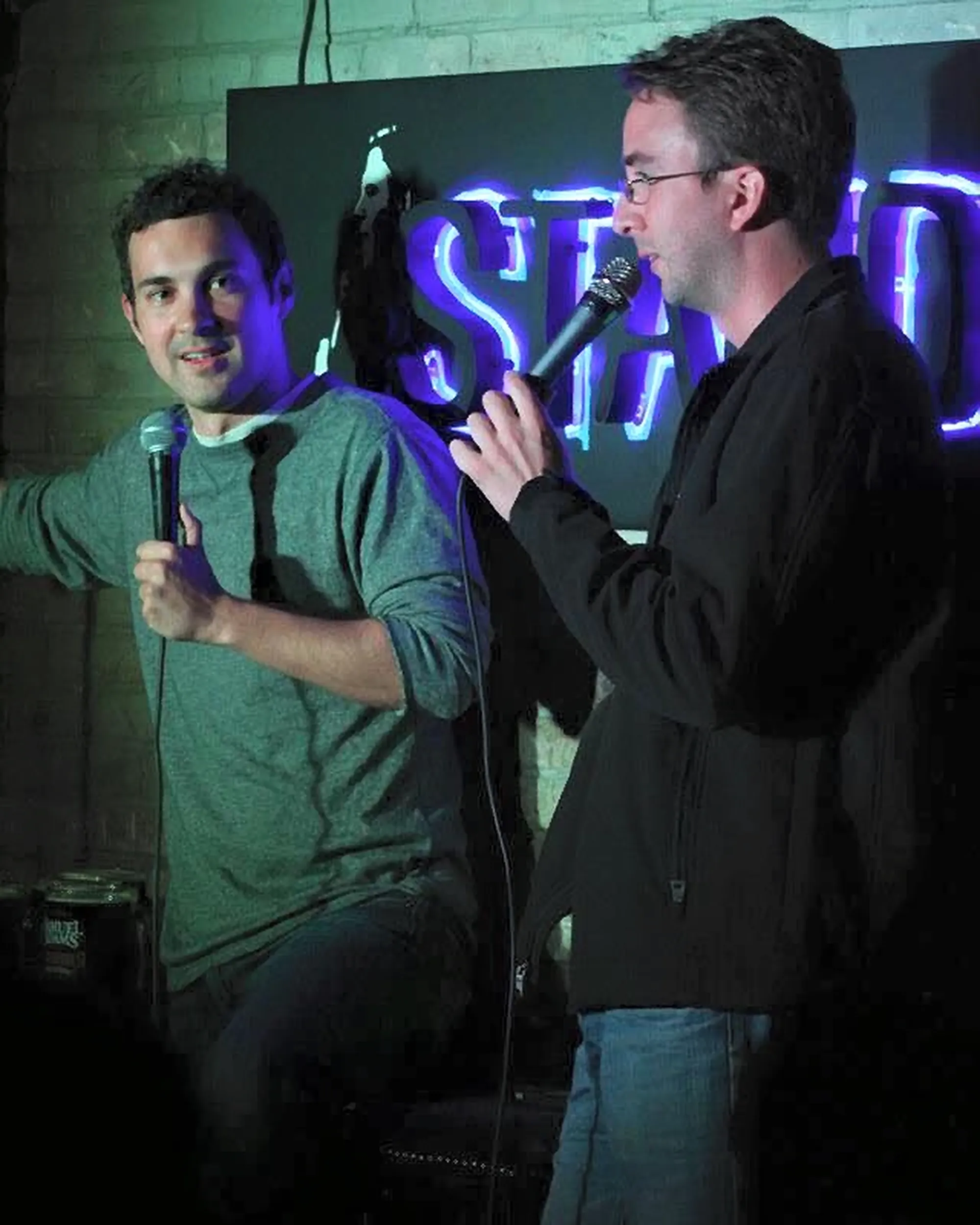 Comedians Mark Normand and Joe List of Tuesdays with Stories performing stand-up at the Comedy Stand. Find Mark Normand Tour Dates and Joe List Tour Dates at www.tuesdayspod.com/find-a-show