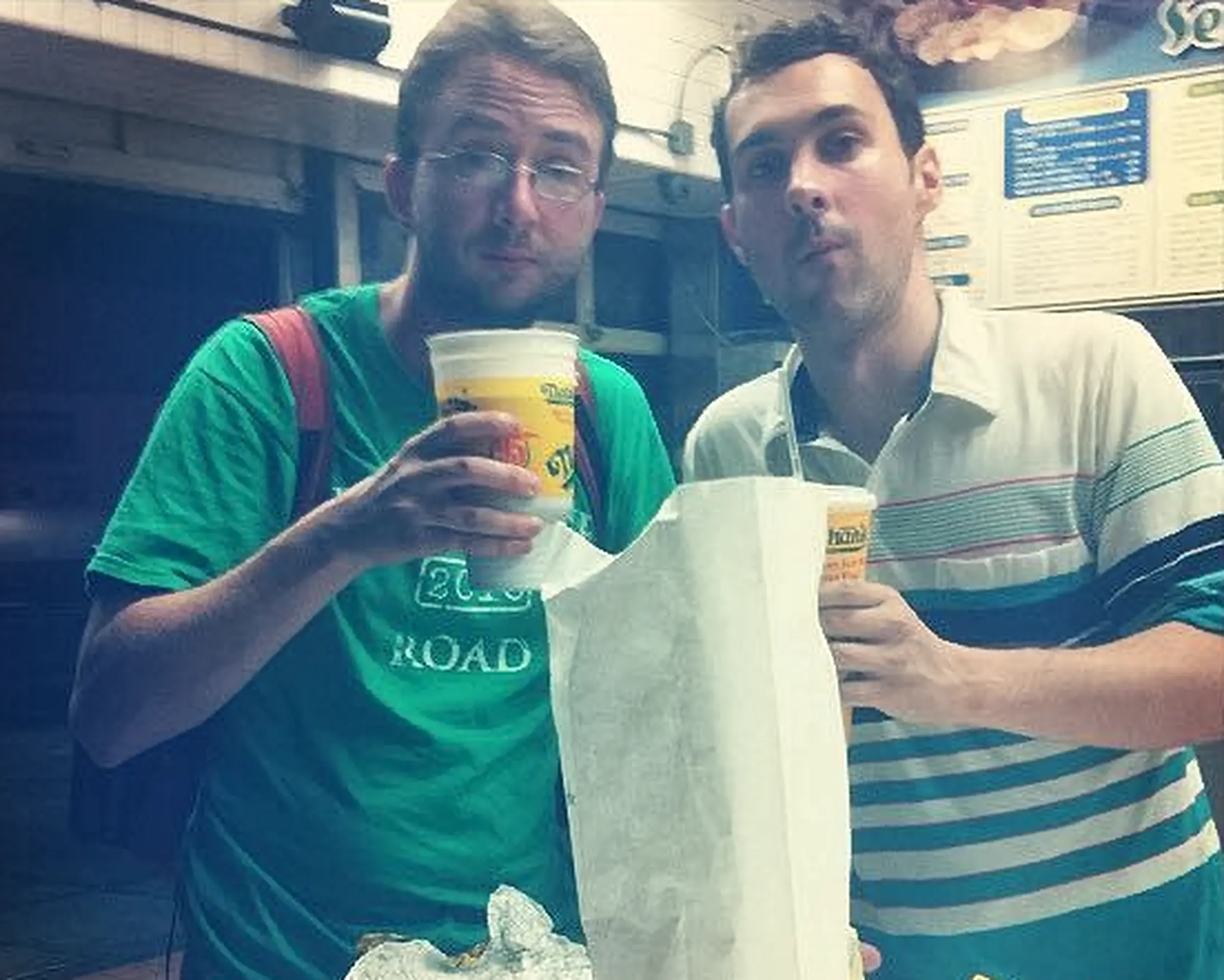 Comedians Mark Normand and Joe List of Tuesdays with Stories eating at Nathan's Famous Hotdogs in NY. Find Mark Normand Tour Dates and Joe List Tour Dates at www.tuesdayspod.com/find-a-show