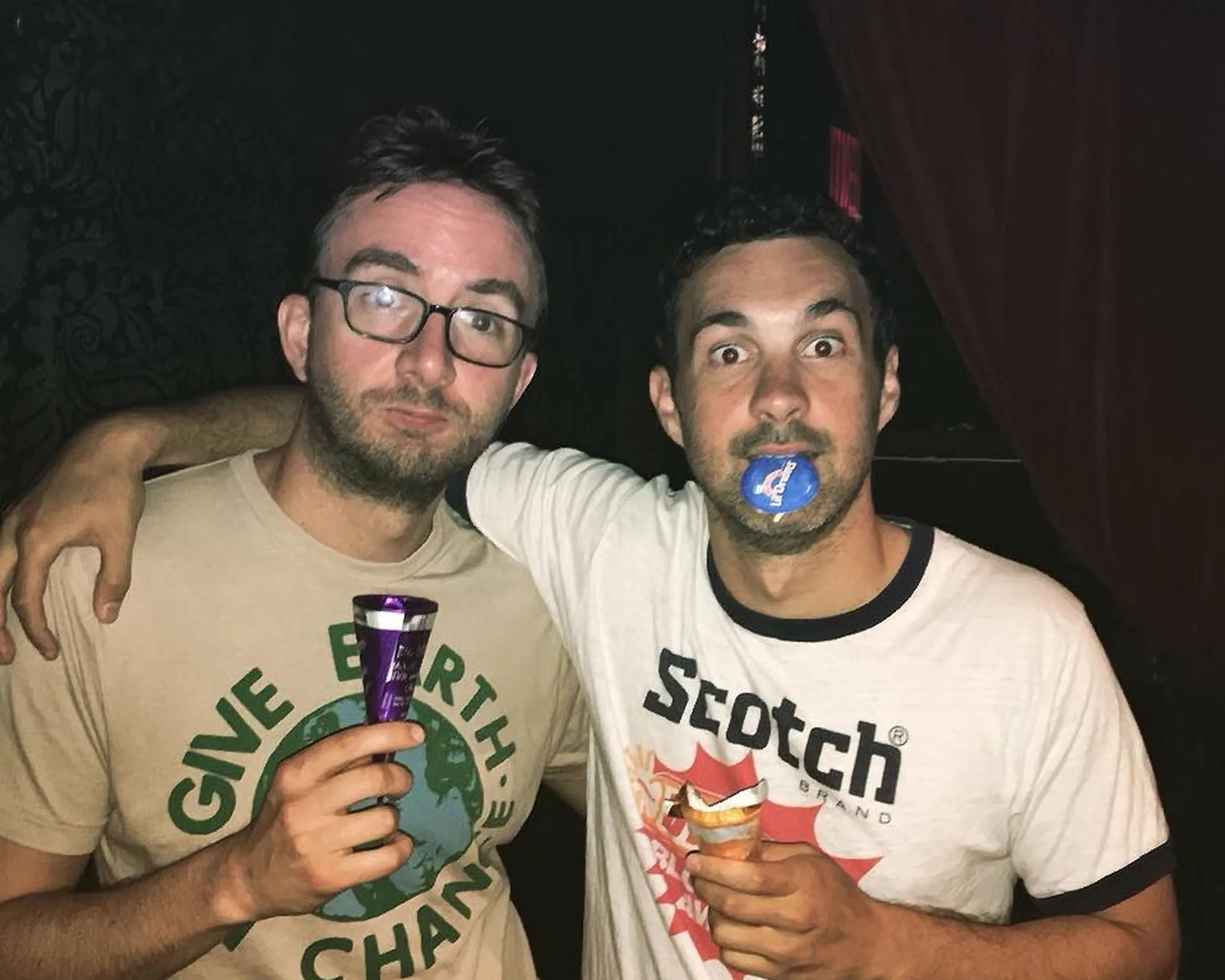 Comedians Mark Normand and Joe List of Tuesdays with Stories in hipster shirts with drumstick ice cream. Find Mark Normand Tour Dates and Joe List Tour Dates at www.tuesdayspod.com/find-a-show
