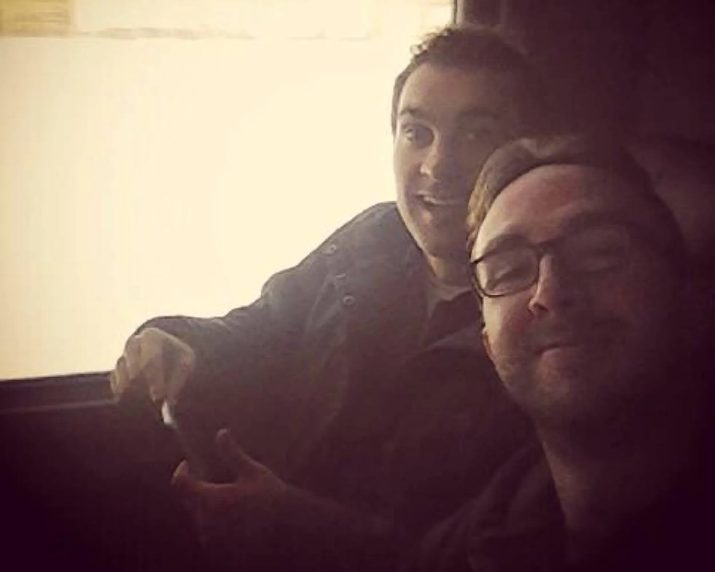 Comedians Mark Normand and Joe List of Tuesdays with Stories on the tour bus taking a selfie. Find Mark Normand Tour Dates and Joe List Tour Dates at www.tuesdayspod.com/find-a-show