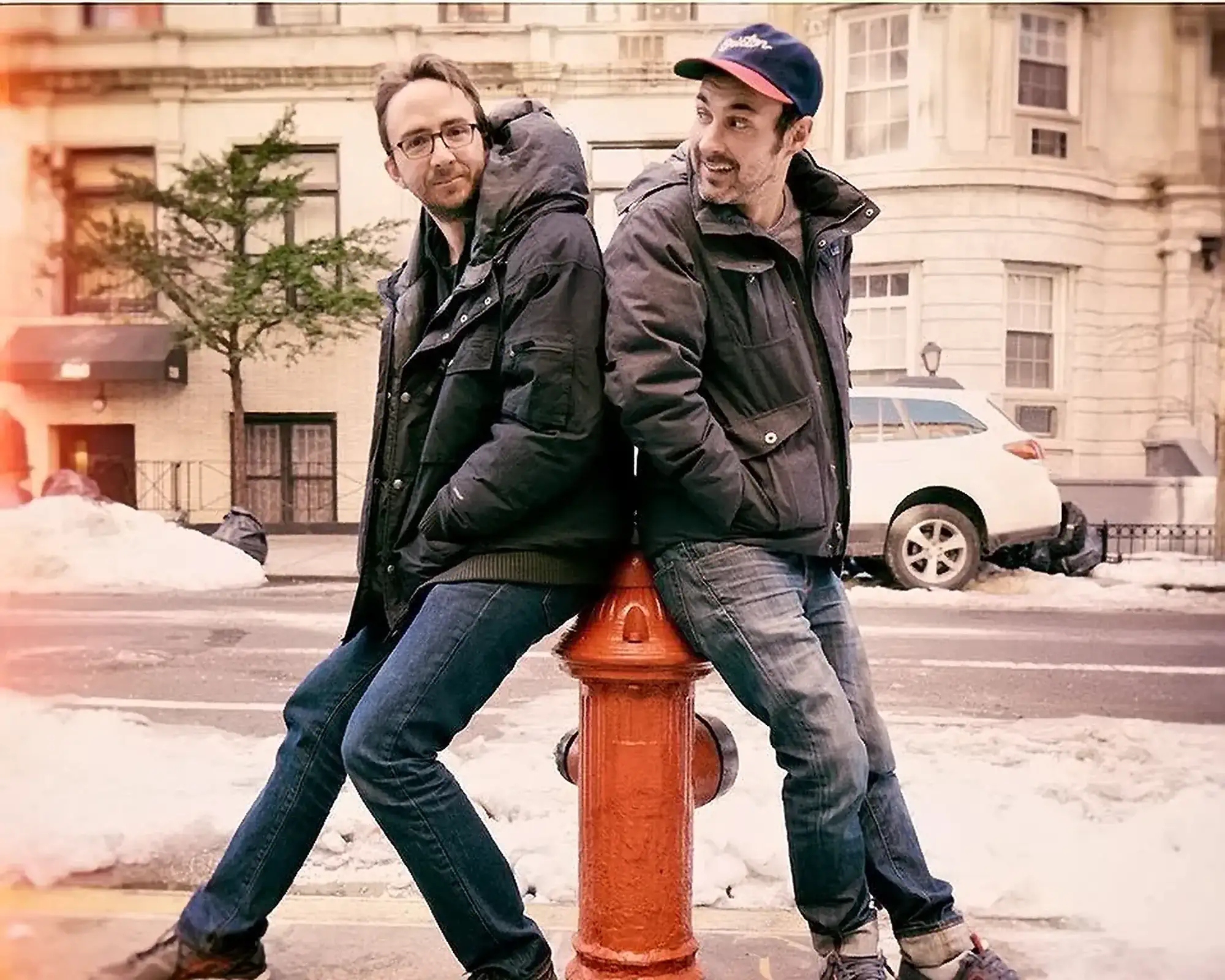 Comedians Mark Normand and Joe List of Tuesdays with Stories on a fire hydrant. Find Mark Normand Tour Dates and Joe List Tour Dates at www.tuesdayspod.com/find-a-show