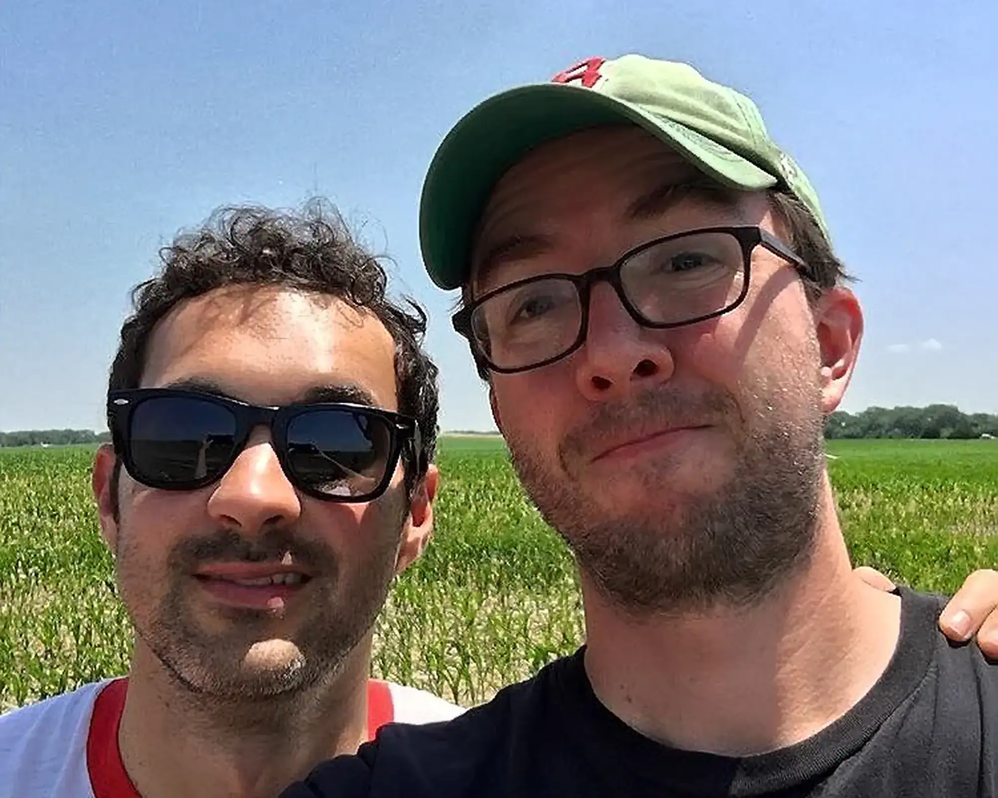Comedians Mark Normand and Joe List of Tuesdays with Stories on a roadtrip, taking a selfie. Find Mark Normand Tour Dates and Joe List Tour Dates at www.tuesdayspod.com/find-a-show
