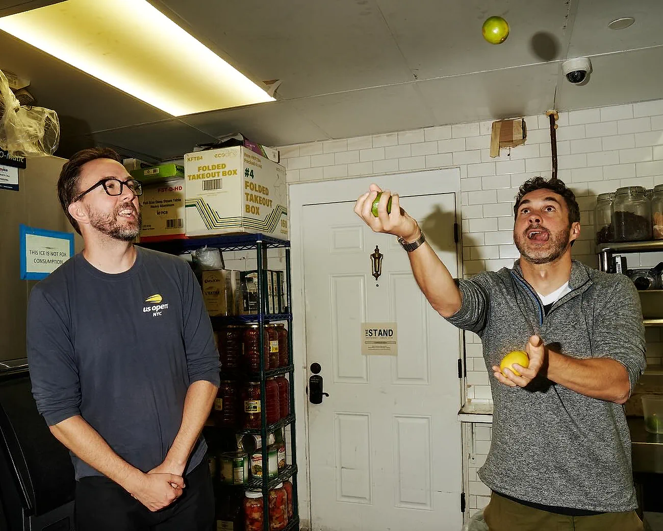 Comedians Mark Normand and Joe List of Tuesdays with Stories, with Mark juggling lemons and limes. Find more Tuesdays with Stories photos at www.tuesdayspod.com/photos