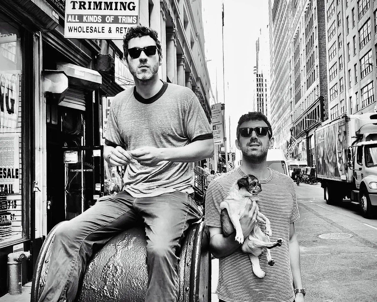 Comedian Sam Morril with a Pug dog in New York City with comedian Mark Normand of Tuesdays with Stories. Find more about Mark Normand at www.tuesdayspod.com/mark-normand