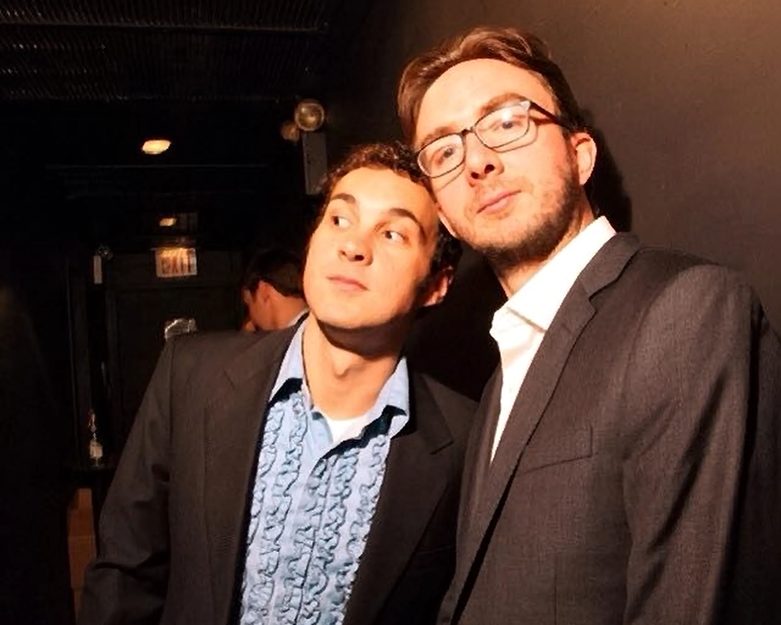 Comedians Mark Normand and Joe List of Tuesdays with Stories in suits, when they were younger and baby-faced. Find Mark Normand Tour Dates and Joe List Tour Dates at www.tuesdayspod.com/find-a-show