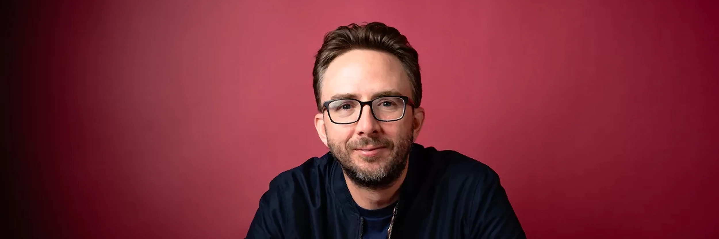 Joe List performing stand-up comedy